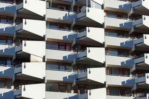 High-rise residential building with balconies and satellite dishes, Trabantenstadt Chorweiler in