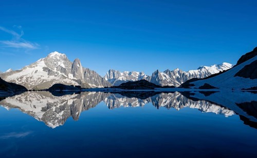 Mountain landscape in the evening light, water reflection in Lac Blanc, mountain peak, Aiguille