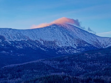 The Giant Mountains with the Schneekoppe in the early morning in winter. Aerial photo. Karpacz,