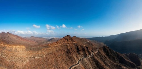 Mountain road at the Degollade de las Yeguas viewpoint with a view of the Barranco de Fataga, Gran