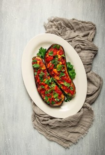 Traditional Turkish dish, Imam Bayildi, stuffed eggplant, with tomatoes and herbs, baked, no