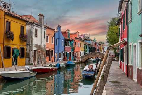 Colorful Houses in Burano beneath a scenic sky, Island of Venice, Italy, Europe