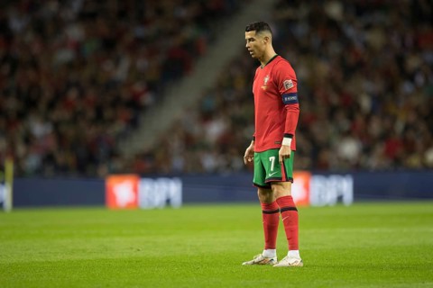 Football match, captain Cristiano RONALDO CR7 Portugal in front of the free kick with closed eyes