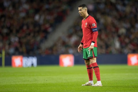 Football match, captain Cristiano RONALDO CR7 Portugal in front of the free kick with concentrated