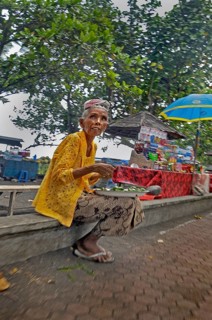 Old lady selling drinks near Amed, Bali, Indonesia, Asia
