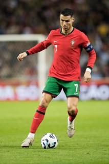 Football match, captain Cristiano RONALDO CR7 Portugal with the ball between both legs, the right