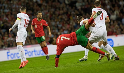 Football match, captain Cristiano RONALDO CR7 Portugal centre has just been fouled and goes down,