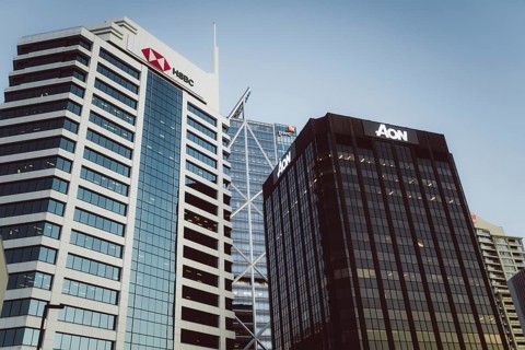 Modern skyscrapers with the HSBC, PWC and AON logos under a clear sky, Auckland, New Zealand,