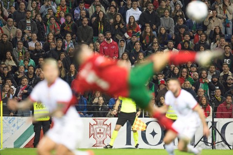 Football match, captain Cristiano RONALDO CR7 Portugal centre in acrobatic overhead kick position