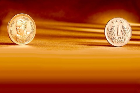 Double pair Indian currency one rupees coin front side and backside manner embossed Rajiv Gandhi