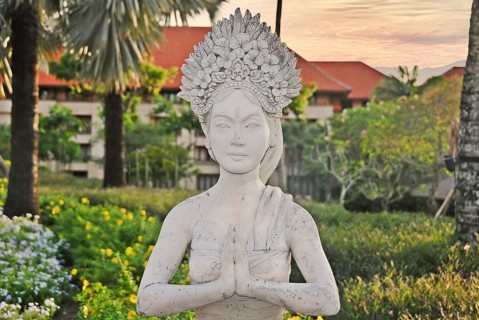 Traditional balinese statue in a public park. Bali, Indonesia, Asia