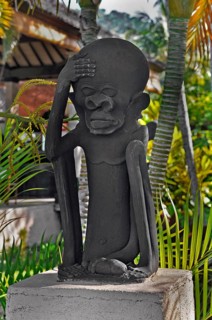 Scurrilous figure, large head and giant penis, near Amed, Bali, Indonesia, Asia