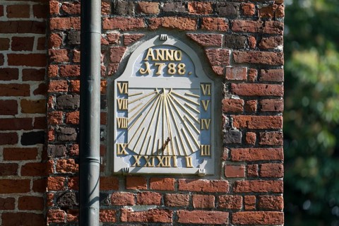 Sundial at the St. Nikolai Church in Altenbruch, district of the medium-sized town of Cuxhaven