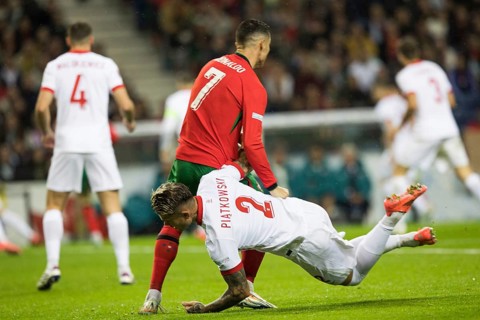 Football match, captain Cristiano RONALDO CR7 Portugal left, looking from behind in a duel with