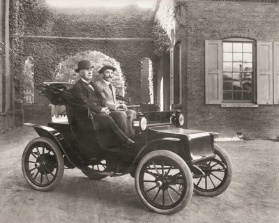 Thomas Edison and Mr. Greenfeldt in a Baker electric automobile, 1910, digitally edited