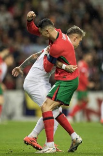 Football match, captain Cristiano RONALDO CR7 Portugal right, looking from behind in a duel with