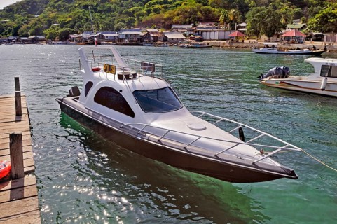 Police speedboat at the jetty, Labuan Bajo, Flores Island, Indonesia, Asia