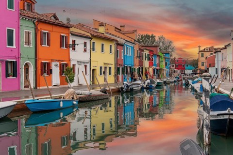 Colorful Houses in Burano beneath a scenic sky, Island of Venice, Italy, Europe