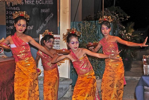 Balinese girls dancing for dinner, Amed, Bali, Indonesia, Asia