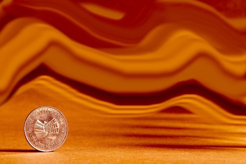 One single Indian currency one rupees coin and artistic background backside embossed Cellular Jail