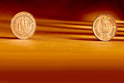 Double pair Indian currency two rupees coin front side and backside manner embossed small happy