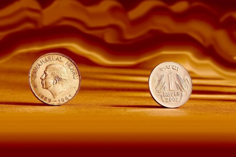 Double pair Indian currency one rupees coin and artistic background front side and backside manner