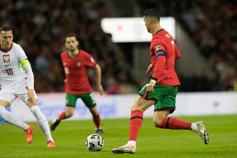 Football match, captain Cristiano RONALDO CR7 Portugal on the right looking at the ball from