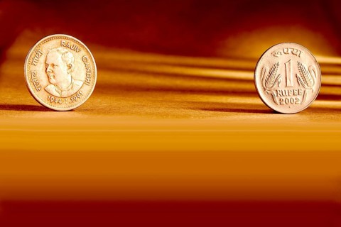 Double pair Indian currency one rupees coin front side and backside manner embossed Rajiv Gandhi
