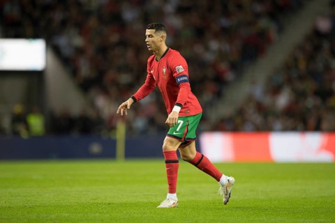Football match, captain Cristiano RONALDO CR7 Portugal in front of the free kick with closed eyes