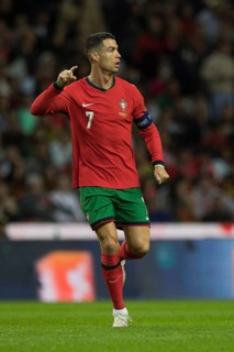 Football match, captain Cristiano RONALDO CR7 Portugal running and pointing with his arm and index