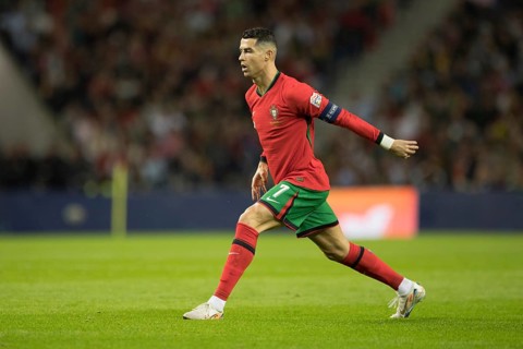 Football match, captain Cristiano RONALDO CR7 Portugal in front of the free kick with closed eyes,