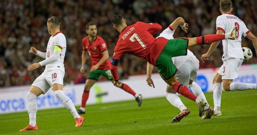 Football match, captain Cristiano RONALDO CR7 Portugal centre has just been fouled and goes down,