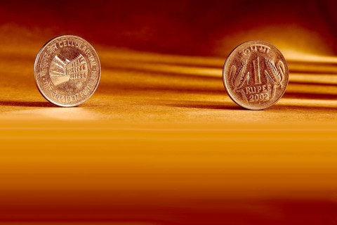 Double pair Indian currency one rupees coin front side and backside manner embossed Cellular Jail
