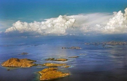 Aerial view, cumulus clouds, cumulus and small islands, flight from Denpasar Bali to Flores,
