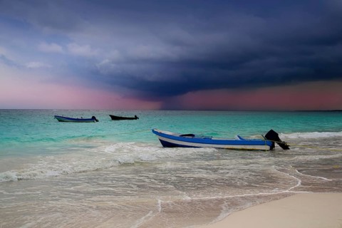 Caribbean before tropical storm hurricane beach boat dramatic scenics