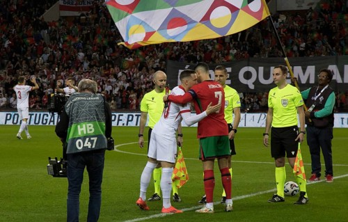 Football match, Cristiano RONALDO CR7 Portugal r. hugs Piotr ZIELINSKI Poland at the place