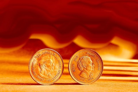Double pair Indian currency five rupees coin and artistic background backside embossed Jawaharlal