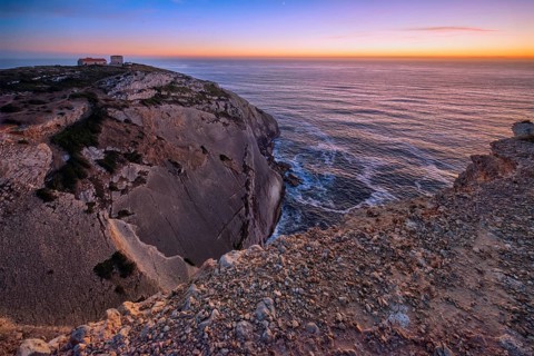Cabo Espichel cape Espichel on Atlantic ocean at sunset with ruins
