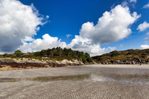 Sand ripples, rocky coast at low tide, bay, White Strand, Castlecove, panoramic road Ring of Kerry,