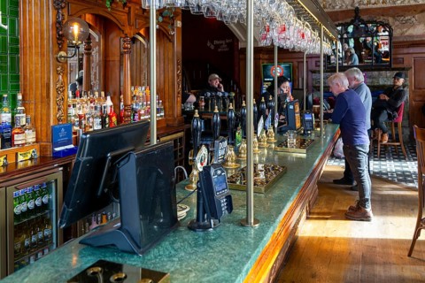 Public bar inside Crown Hotel pub in city centre of Liverpool, England, UK