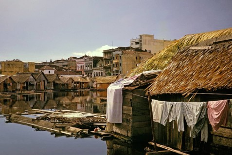 Informal shelters built on logs, known as the floating city, Manaus, Brazil 1962 Building on solid