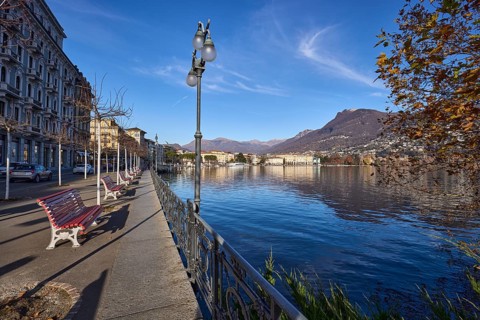 Lakeside promenade, benches, city trees, general development, lantern, blue sky, cirrus clouds,