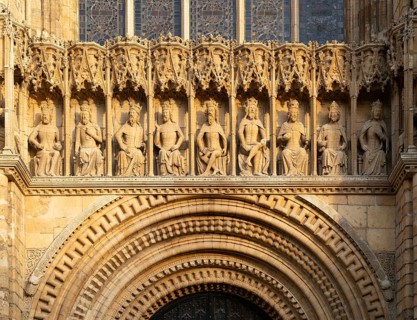Carved stonework figures of kings, Gallery of Kings, frontage of cathedral church, Lincoln,