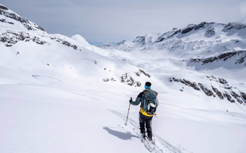 Ski tourer, winter in the Bernese Alps, ascent to the Wildstrubelhütte, Bernese Oberland,