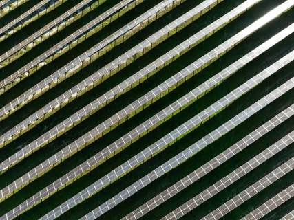Rows of solar panels at a photovoltaic plant near the town of Espejo. Aerial view. Drone shot.
