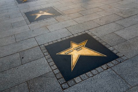 Stars on stone slabs as part of a promenade commemorating personalities, Lódz, Lodz, Poland, Europe
