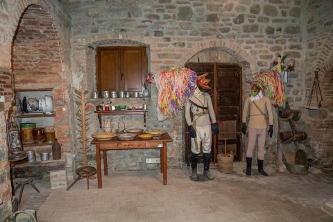 Interior with folk costumes in museum in Aliano, the very poor village in southern Italy that the