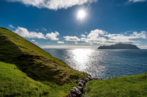 View of the island of Mykines, old stone wall, Gásadalur, Vágar, Faroe Islands, Denmark, Europe
