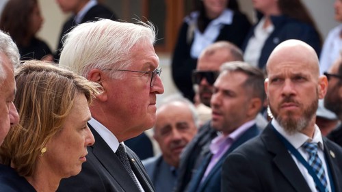 Group of people in formal dress during an event, visit of Federal President Frank-Walter Steinmeier
