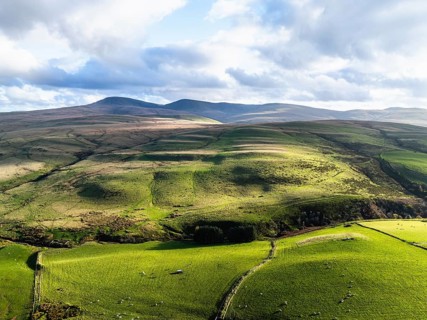 Farms over Black Mountain from a drone, Brecon Beacons National Park, Carmarthenshire, Wales,